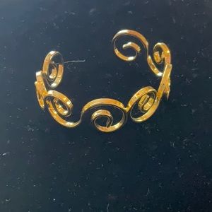 Gold swirl cuff bracelet